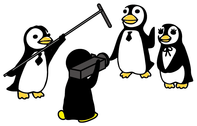 取材を受けるファーミーくん（ペンギン）